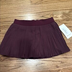 Lululemon varsity high rise pleated tennis skirt in garnet NWT